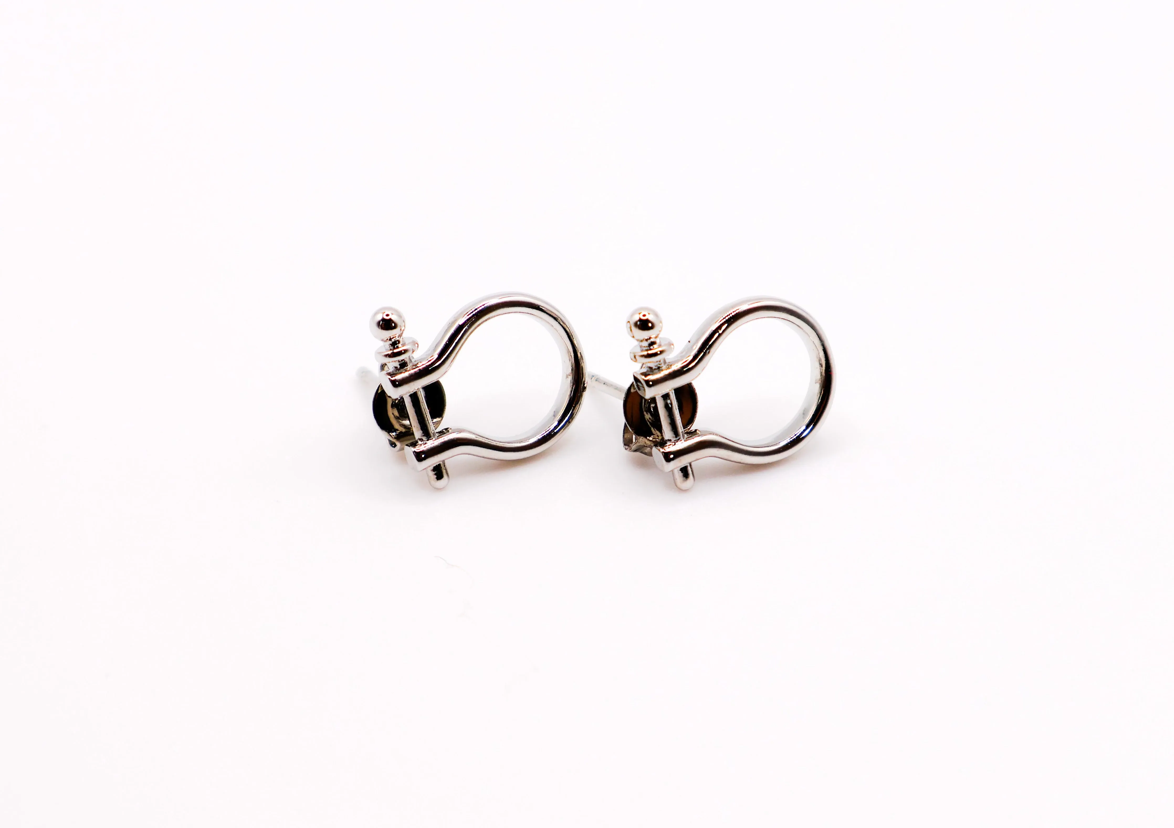 Whimsical White Gold Horseshoe Earrings